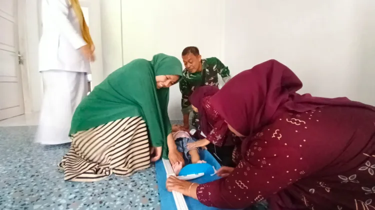 Satgas TMMD ke-129 Gandeng DP3AK Gelar Posyandu di Beutong, TNI Pastikan Ibu dan Anak Dapat Layanan Kesehatan Optimal